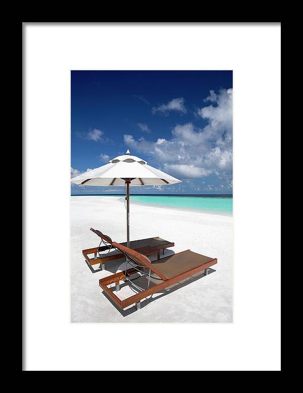 Outdoors Framed Print featuring the photograph Deck Chairs And Tropical Beach by Sakis Papadopoulos