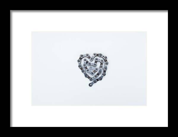 White Background Framed Print featuring the photograph Dirty Bicycle Chain Shaped As A Heart by Noah Clayton