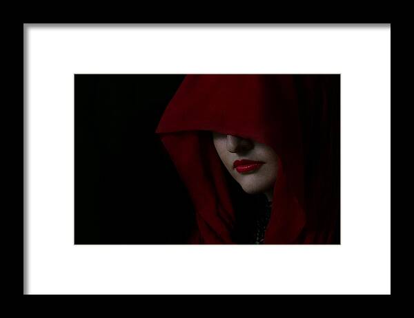 Red Framed Print featuring the photograph Disguised in Red by Elvira Pinkhas