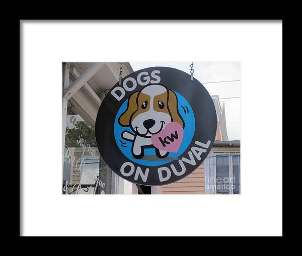 Dogs On Duval Street Framed Print featuring the photograph Dogs On Duval by Fiona Kennard