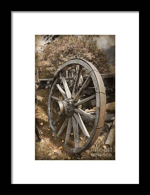 Wagon Wheel Framed Print featuring the photograph Done its job by David Birchall