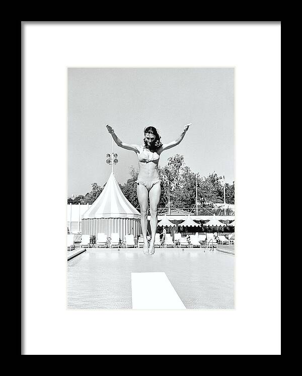 Personality Framed Print featuring the photograph Donna Garrett Jumping On Diving Board by William Connors