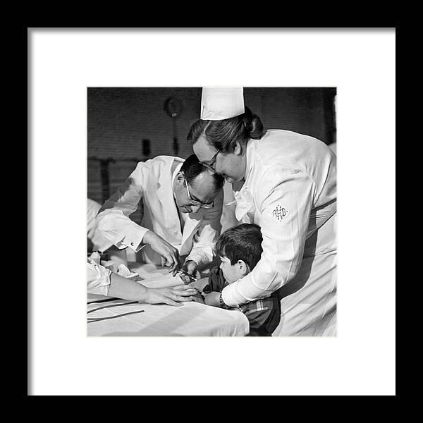 1954 Framed Print featuring the photograph Dr.Jonas Salk Giving Vaccine by Underwood Archives