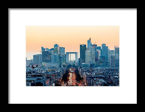 Financial Building Framed Print featuring the photograph Elevated view of illuminated skyscrapers at La Defense financial district and Avenue des Champs-Elysees at dusk, Paris, France by Alexander Spatari