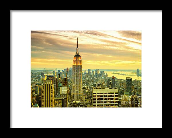 New York City Framed Print featuring the photograph Empire State Building in the Evening by Sabine Jacobs