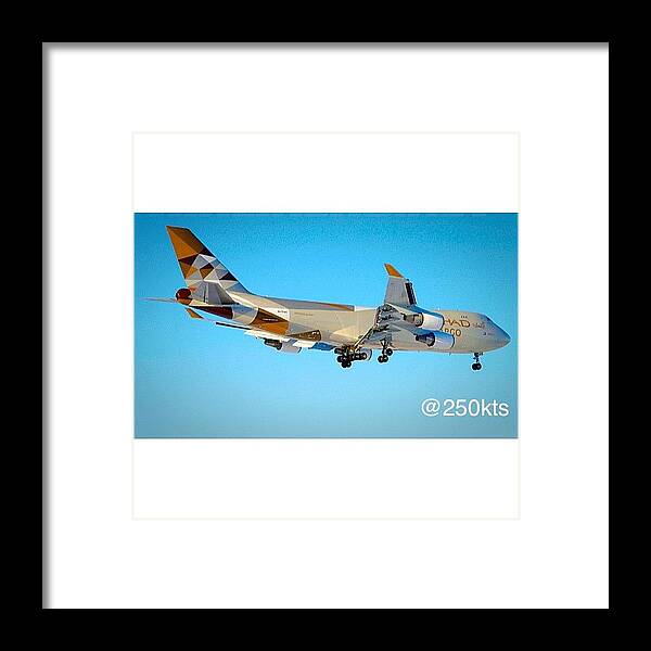 Etihad Framed Print featuring the photograph Etihad Cargo (atlas Air) B747-47uf by Rafael Ganzer