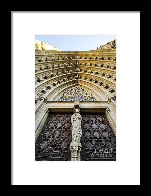 Cathedral Of The Holy Cross And Saint Eulalia Framed Print featuring the photograph Eulalia Doorway by Deborah Smolinske