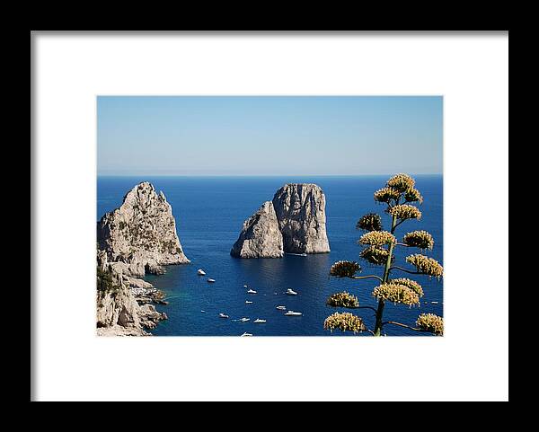 Faraglioni Framed Print featuring the photograph Faraglioni in Capri by Dany Lison