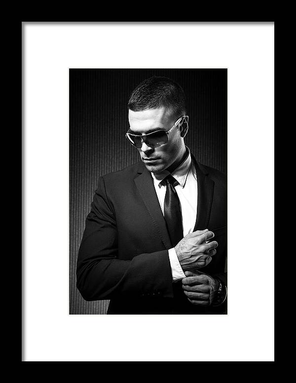 Expertise Framed Print featuring the photograph Fashion Man by Georgijevic