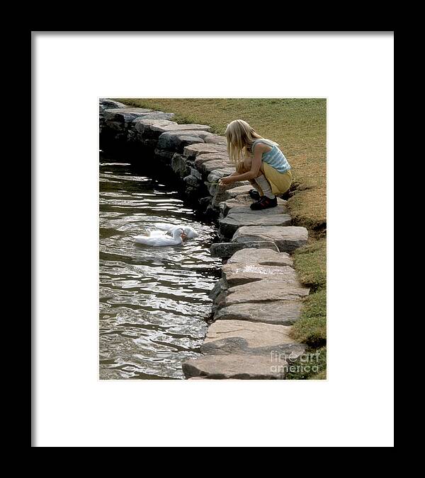 Young Framed Print featuring the photograph Feeding the Ducks by ELDavis Photography
