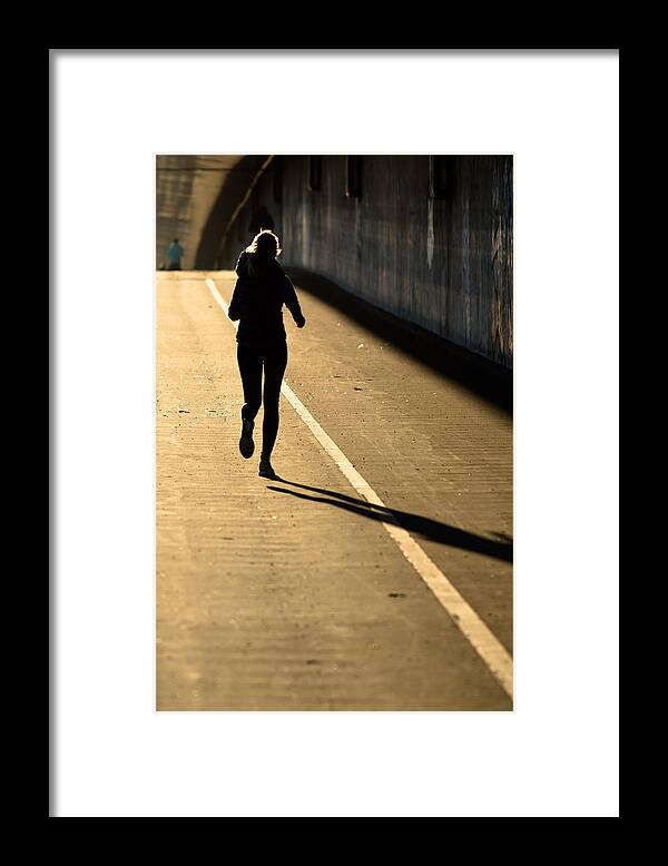 Girl Framed Print featuring the photograph Female Jogger In Backlight by Andreas Berthold