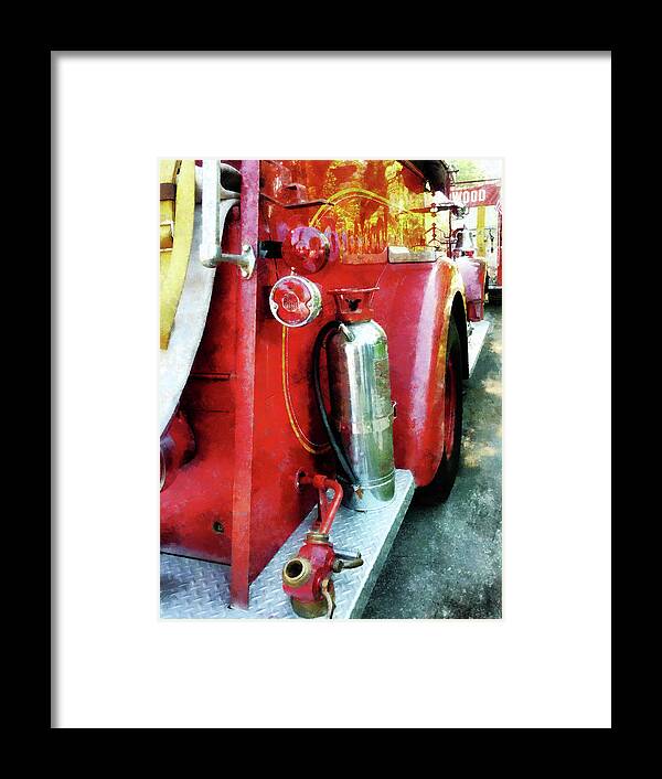 Firefighters Framed Print featuring the photograph Fireman - Fire Extinguisher on Fire Truck by Susan Savad