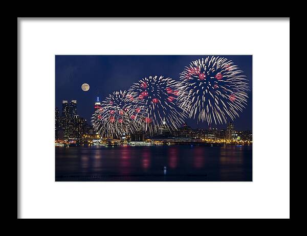 4th Of July Framed Print featuring the photograph Fireworks and Full Moon Over New York City by Susan Candelario