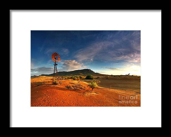 First Light Early Morning Windmill Dam Rawnsley Bluff Wilpena Pound Flinders Ranges South Australia Australian Landscape Landscapes Outback Red Earth Blue Sky Dry Arid Harsh Framed Print featuring the photograph First Light on Wilpena Pound by Bill Robinson