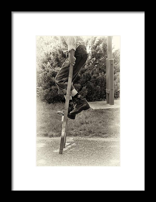 Portraits Framed Print featuring the photograph First Time on Stilts at White Pine Village in Ludington Michigan by Mary Lee Dereske