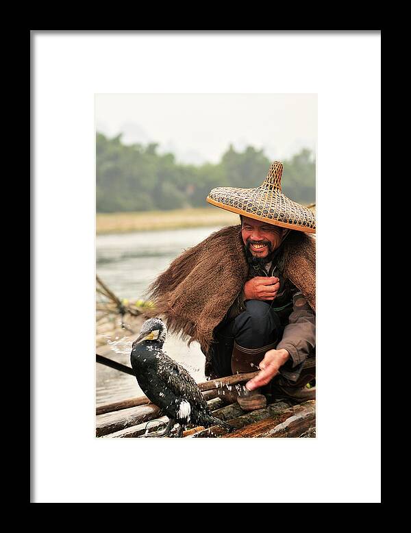 Chinese Culture Framed Print featuring the photograph Fisherman And His Cormorant On Li River by Huang Xin