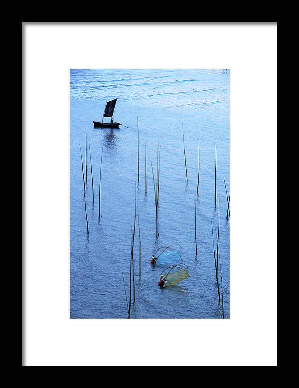 Working Framed Print featuring the photograph Fishermen Working In High-tide Mudflats by Melindachan