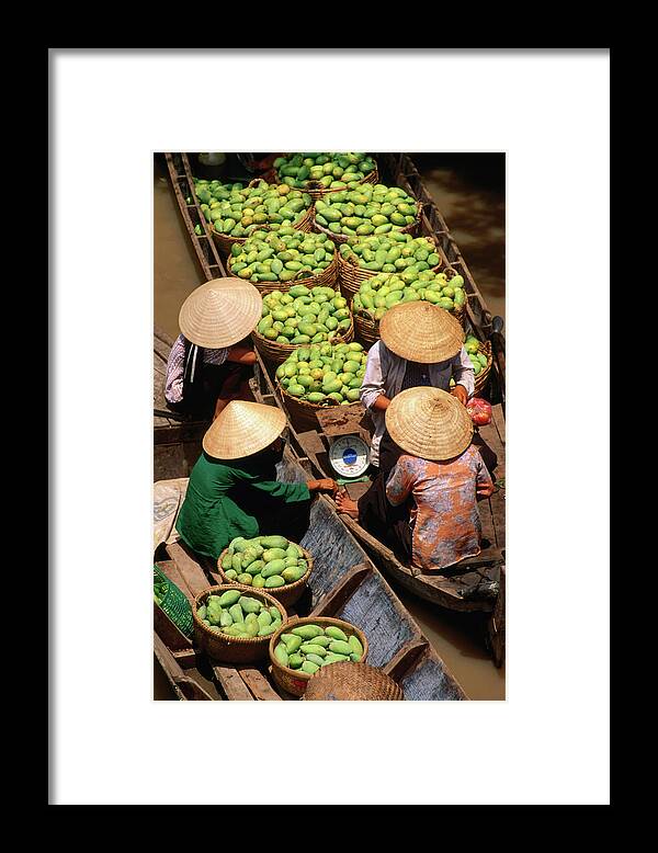 Headwear Framed Print featuring the photograph Floating Market Along The Mekong Delta by John W Banagan