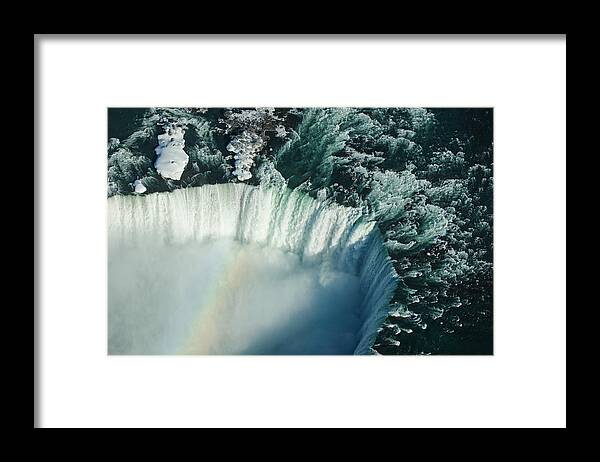 Niagara Falls Framed Print featuring the photograph Flying Over Icy Niagara Falls by Georgia Mizuleva
