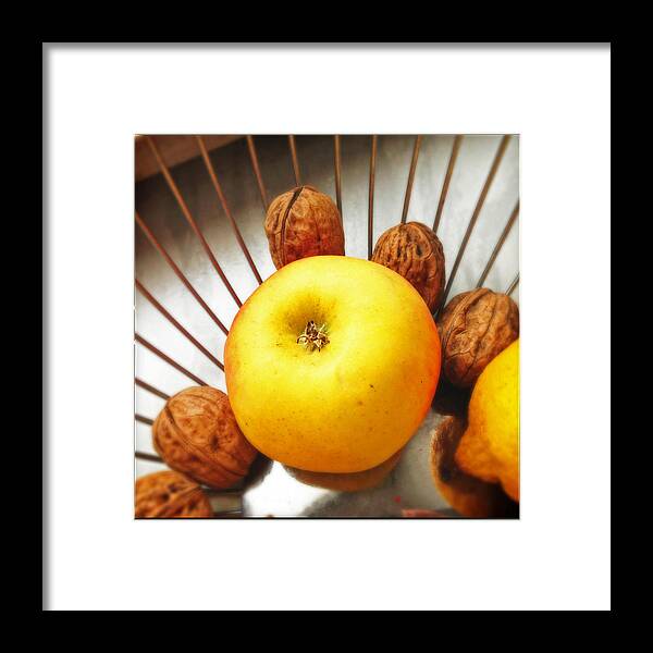 Apple Framed Print featuring the photograph Food still life - yellow apple and brown walnuts - beautiful warm colors by Matthias Hauser