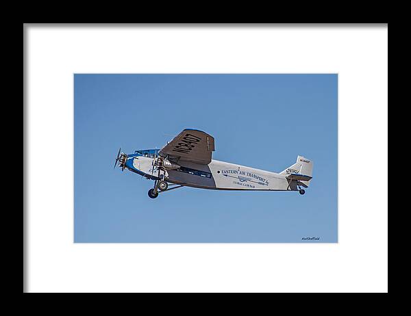 Airplane Framed Print featuring the photograph Ford Tri-Motor In Flight by Allen Sheffield