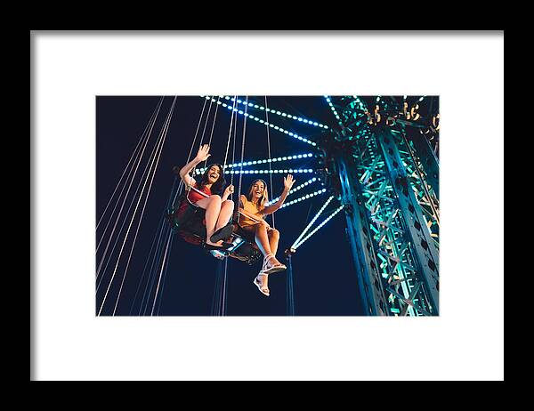 People Framed Print featuring the photograph Friends on chain swing ride by Martin-dm