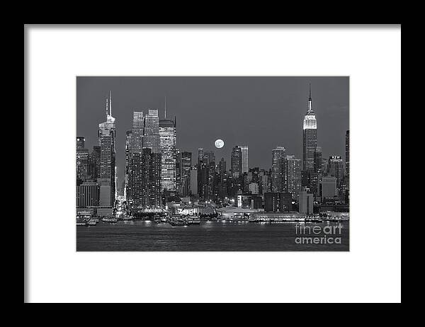Clarence Holmes Framed Print featuring the photograph Full Moon Rising Over New York City III by Clarence Holmes