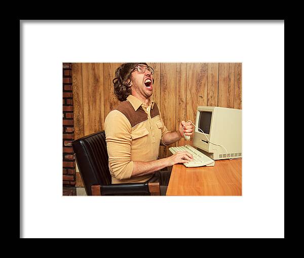 Working Framed Print featuring the photograph Funny angry 1980's office worker by Sjharmon