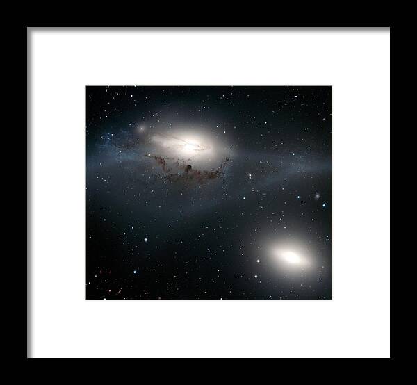 Ngc 4438 Framed Print featuring the photograph Galaxies Ngc 4438 And Ngc 4435 by European Southern Observatory/science Photo Library