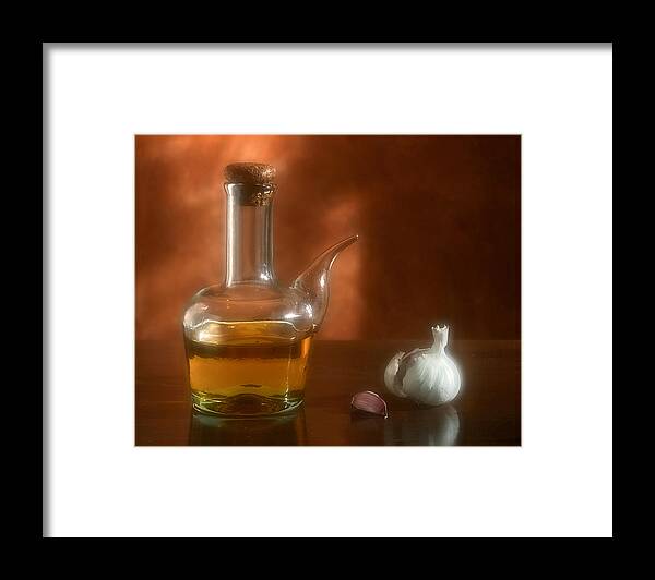 Garlic Framed Print featuring the photograph Garlic and Olive Oil. by Juan Carlos Ferro Duque