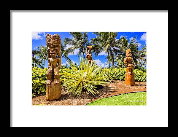 Hawaiian Tikis Framed Print featuring the photograph Giant Hawaiian Tikis by Aloha Art