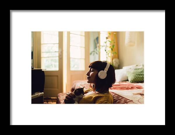 Pets Framed Print featuring the photograph Girl spending the weekend at home by Martin-dm