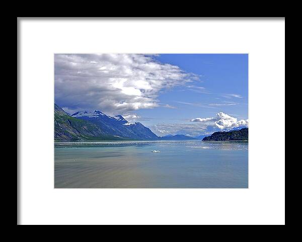 Clouds Framed Print featuring the photograph Glacier in Bay by Ralph Jones