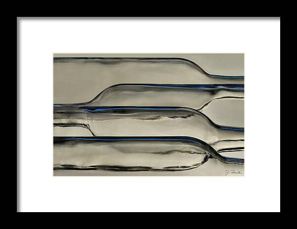 Bottle Framed Print featuring the photograph Glass Layers by Joe Bonita