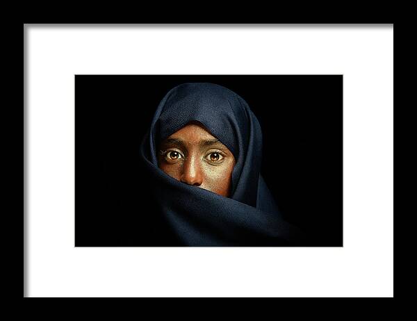 Dark Framed Print featuring the photograph Gold Eyes by Fathi Aldarwish