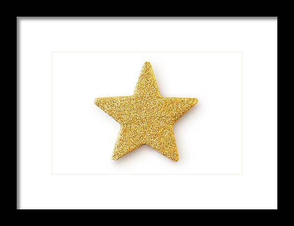 Event Framed Print featuring the photograph Gold star. Christmas decoration. by Malerapaso