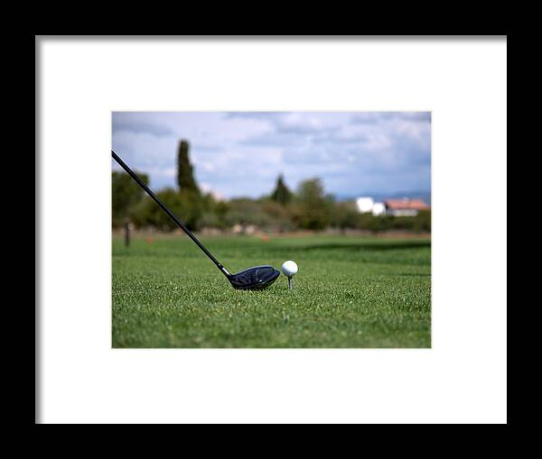 Grass Framed Print featuring the photograph Golfclub And Ball by Miguel Sotomayor
