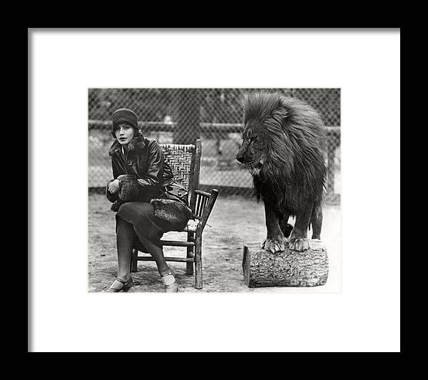 Lion Framed Print featuring the photograph Greta Garbo and Leo the Lion in 1926 by Sad Hill - Bizarre Los Angeles Archive