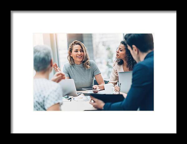 Expertise Framed Print featuring the photograph Group of business persons in discussion by Pixelfit