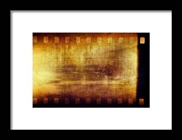 Film Framed Print featuring the photograph Grunge filmstrip by Les Cunliffe