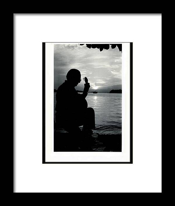 Guitar Framed Print featuring the photograph Guitarist by the Sea by Alice Terrill