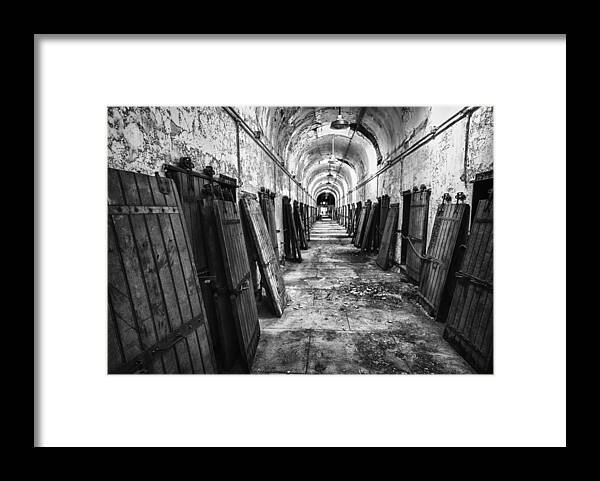 Crystal Yingling Framed Print featuring the photograph Hall of Doors by Ghostwinds Photography