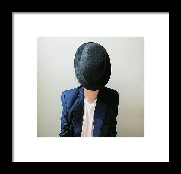 Hiding Framed Print featuring the photograph Hat Very Shy by Heitor Magno