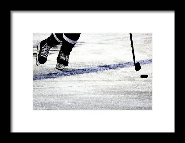 Hockey Framed Print featuring the photograph He Skates by Karol Livote