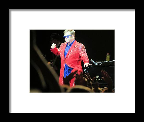 Elton John Framed Print featuring the photograph He still has it by Aaron Martens