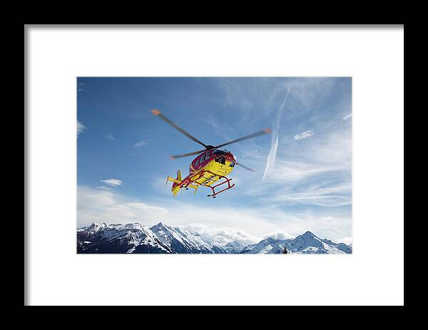 Snow Framed Print featuring the photograph Helicopter In The Mountains by Chris Tobin