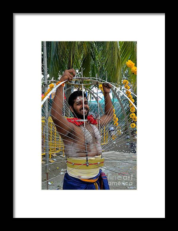 Thaipusam Hindu Procession Tamil Indian Devotee Hinduism Framed Print featuring the photograph Hindu Thaipusam festival pierced devotee by Imran Ahmed