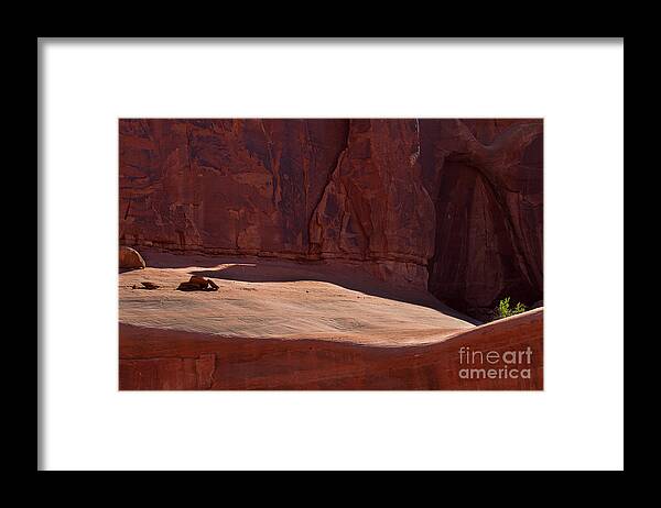 Arches National Park Print Framed Print featuring the photograph Hold On by Jim Garrison