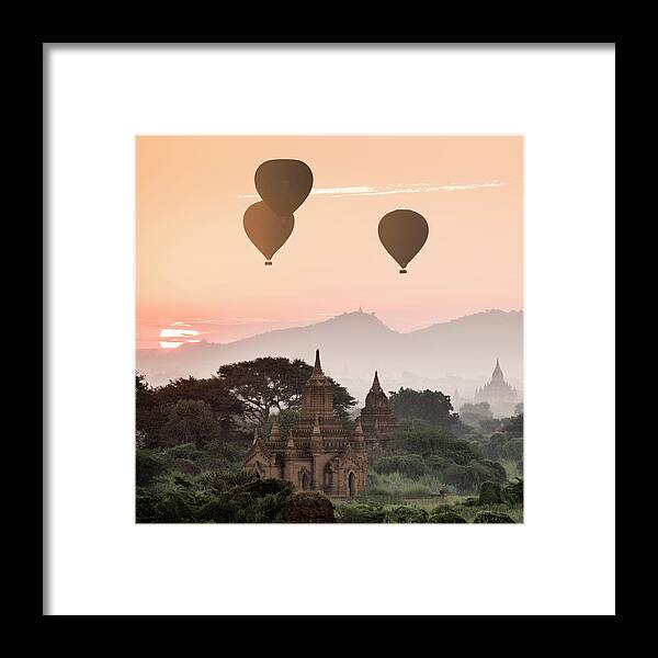 Built Structure Framed Print featuring the photograph Hot Air Balloons Flying Over Temples At by Martin Puddy