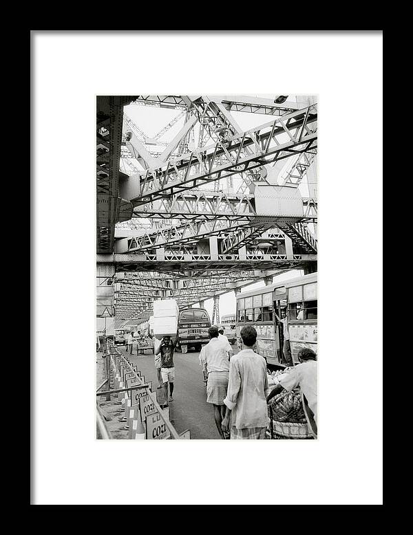 Howrah Framed Print featuring the photograph On Howrah Bridge in Calcutta by Shaun Higson
